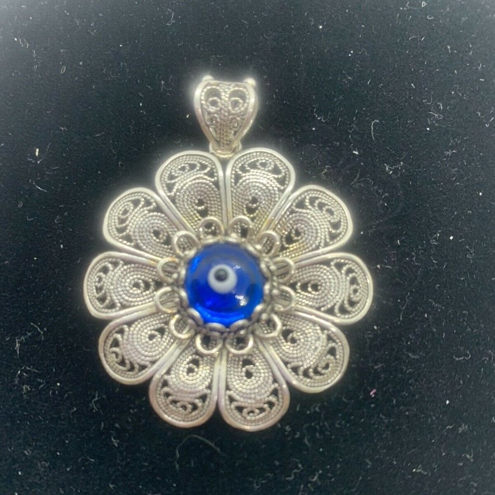 DGS Sterling Silver 925 Flower Pendant W/Blue Eye Center Stone